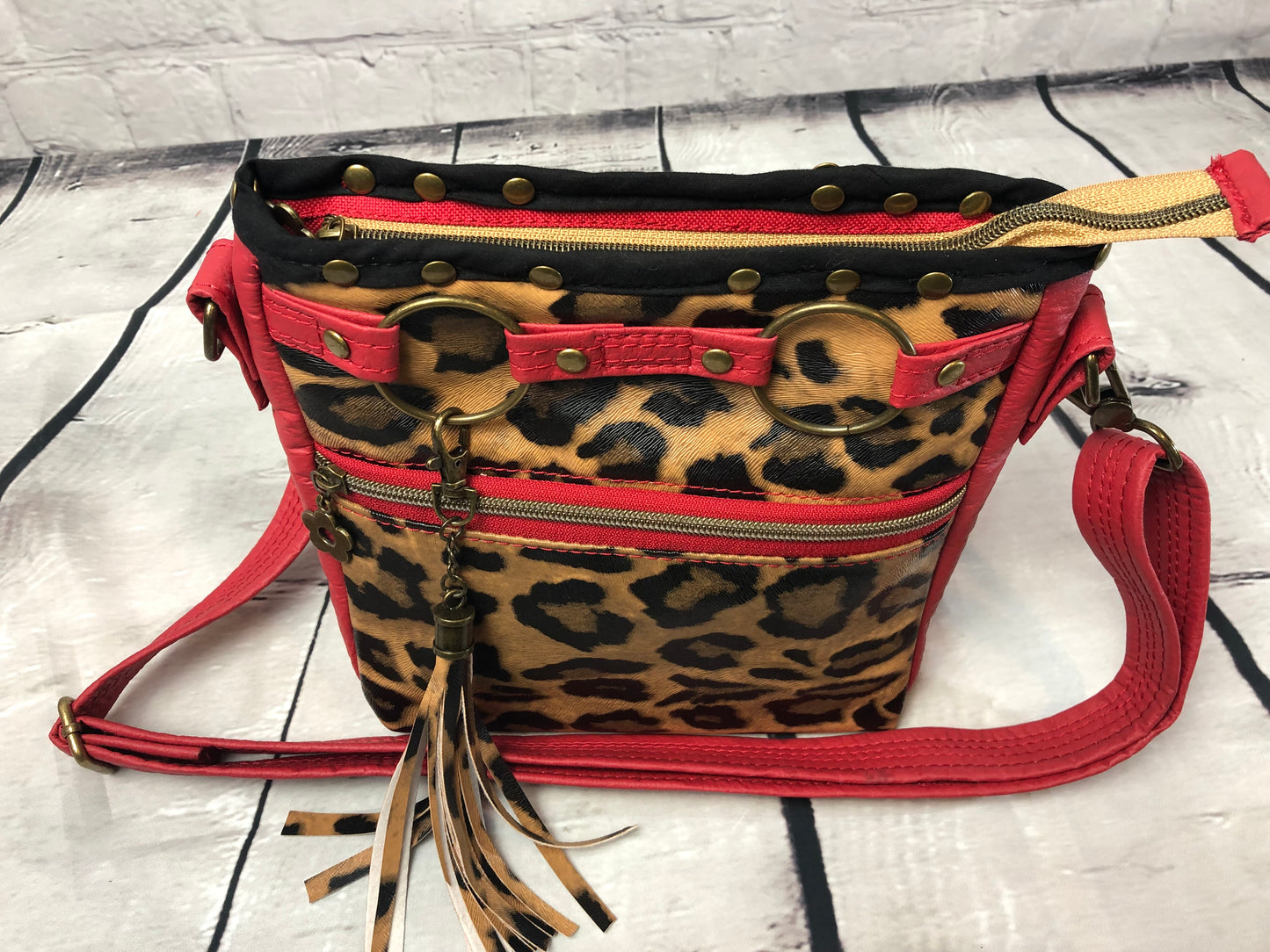 SOLD Red vinyl & animal print shoulder bag