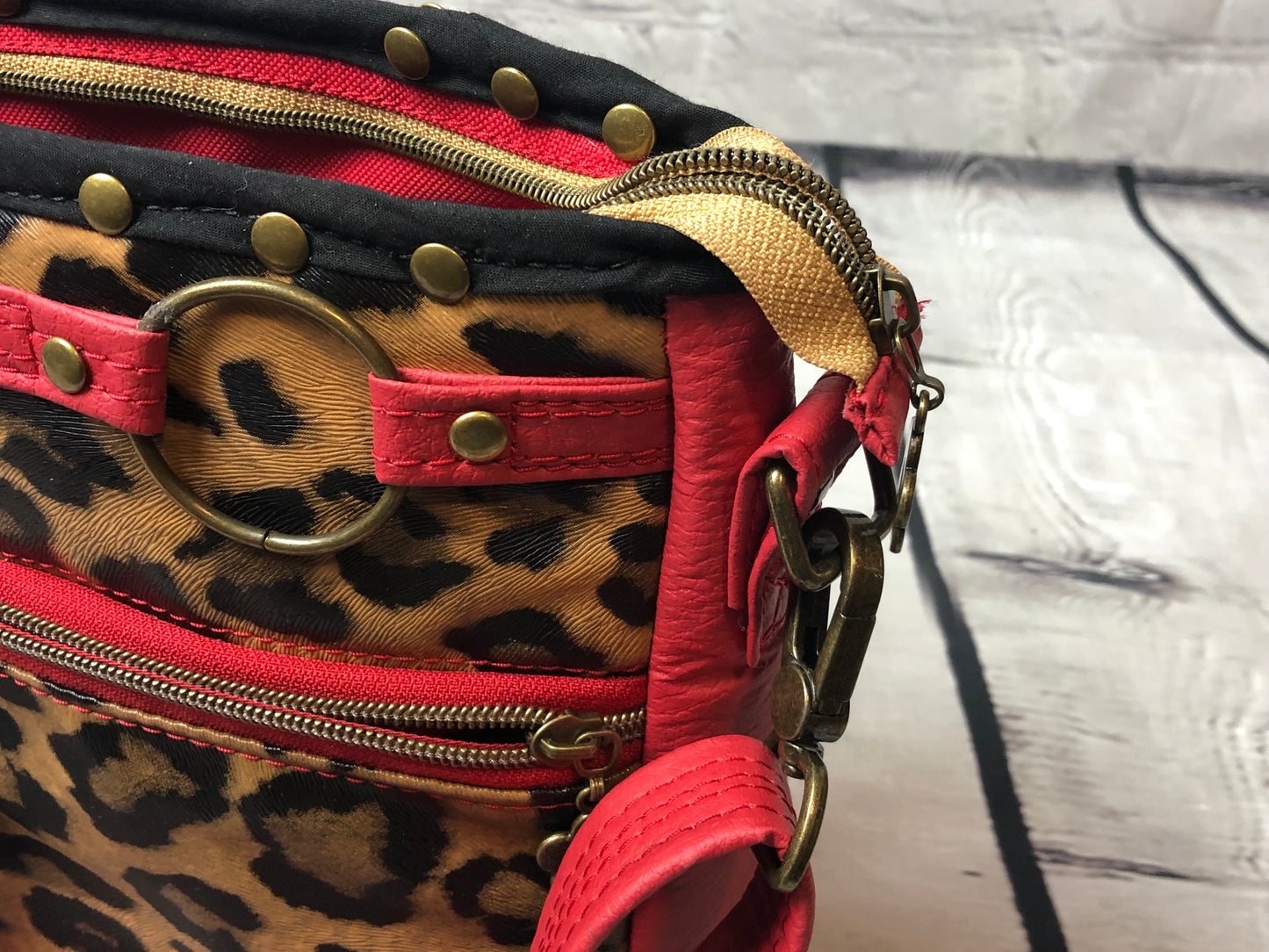 SOLD Red vinyl & animal print shoulder bag