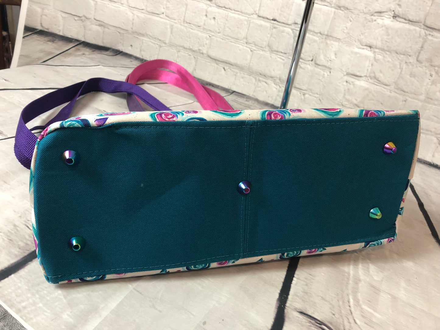 Perfectly imperfect seam. with some very sexy rainbow purse feet and hardware