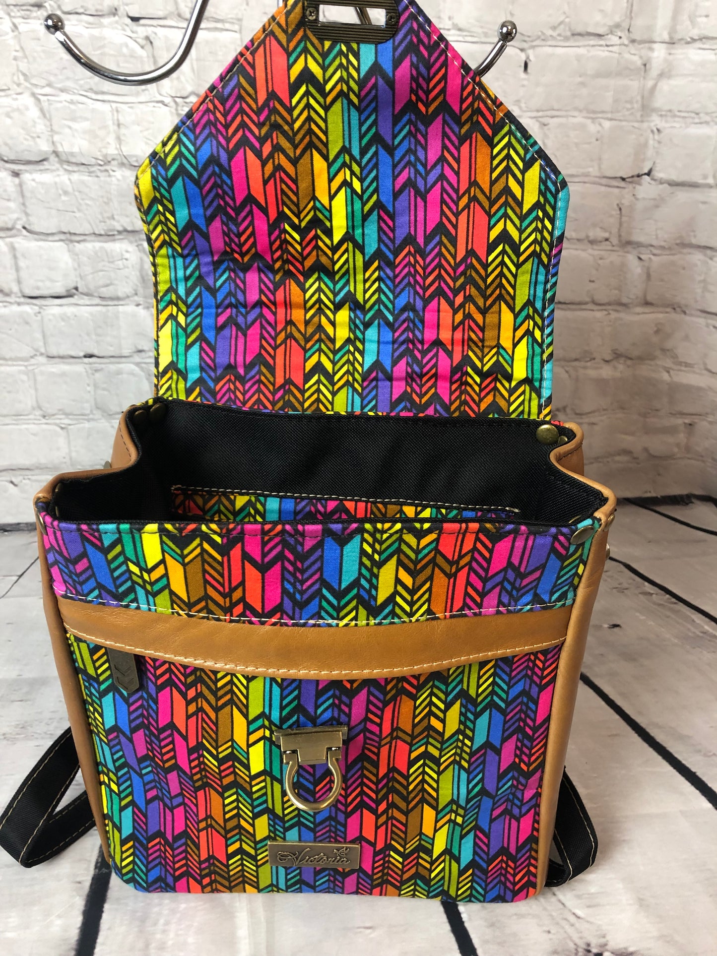 Inside flap is bright and cheerful with the Anna Marie fabricMeraki leather trim backpack with designer Anna Marie colorful fabric..