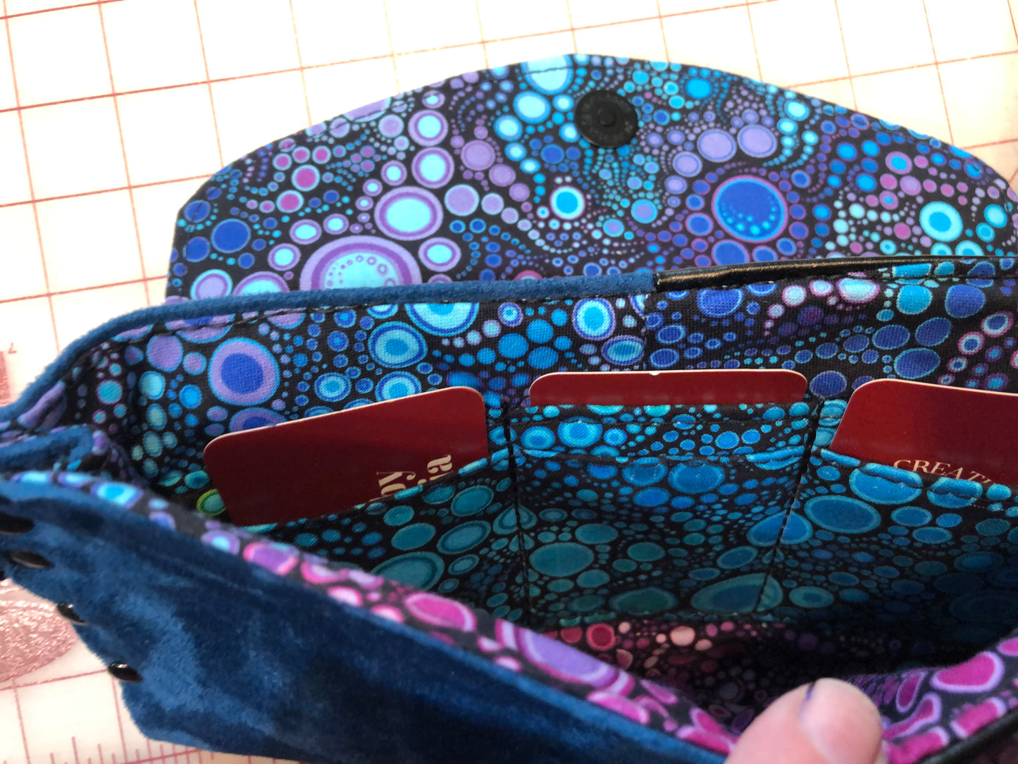 Clutch wristlet in faux suede & vinyl