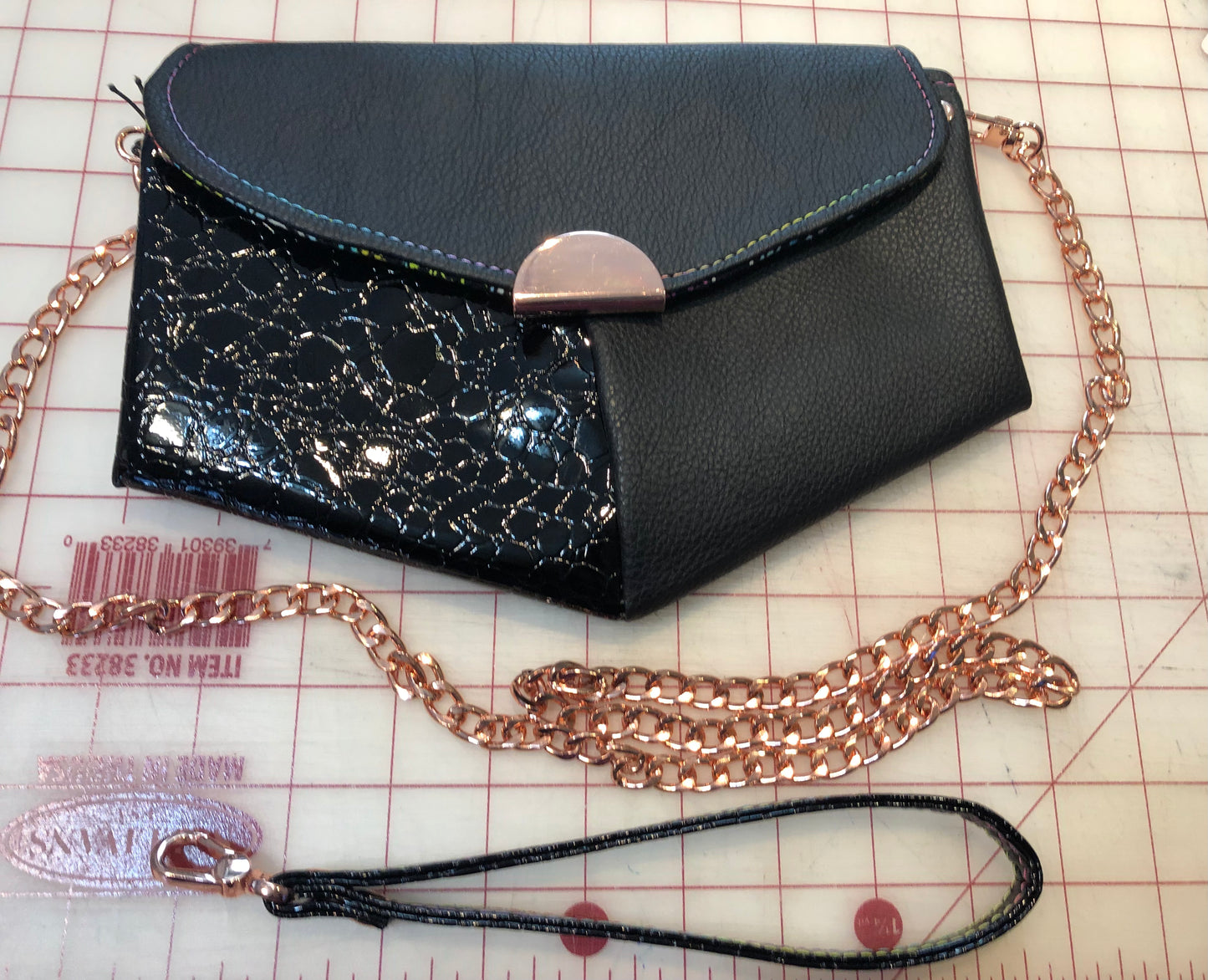 2 tone black clutch/Wallet. Rose gold hardware