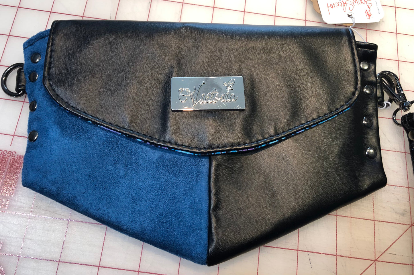 Clutch wristlet in faux suede & vinyl