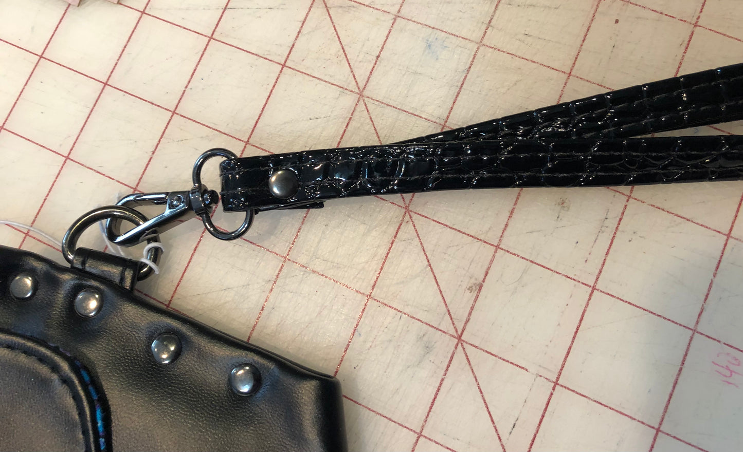 Clutch wristlet in faux suede & vinyl