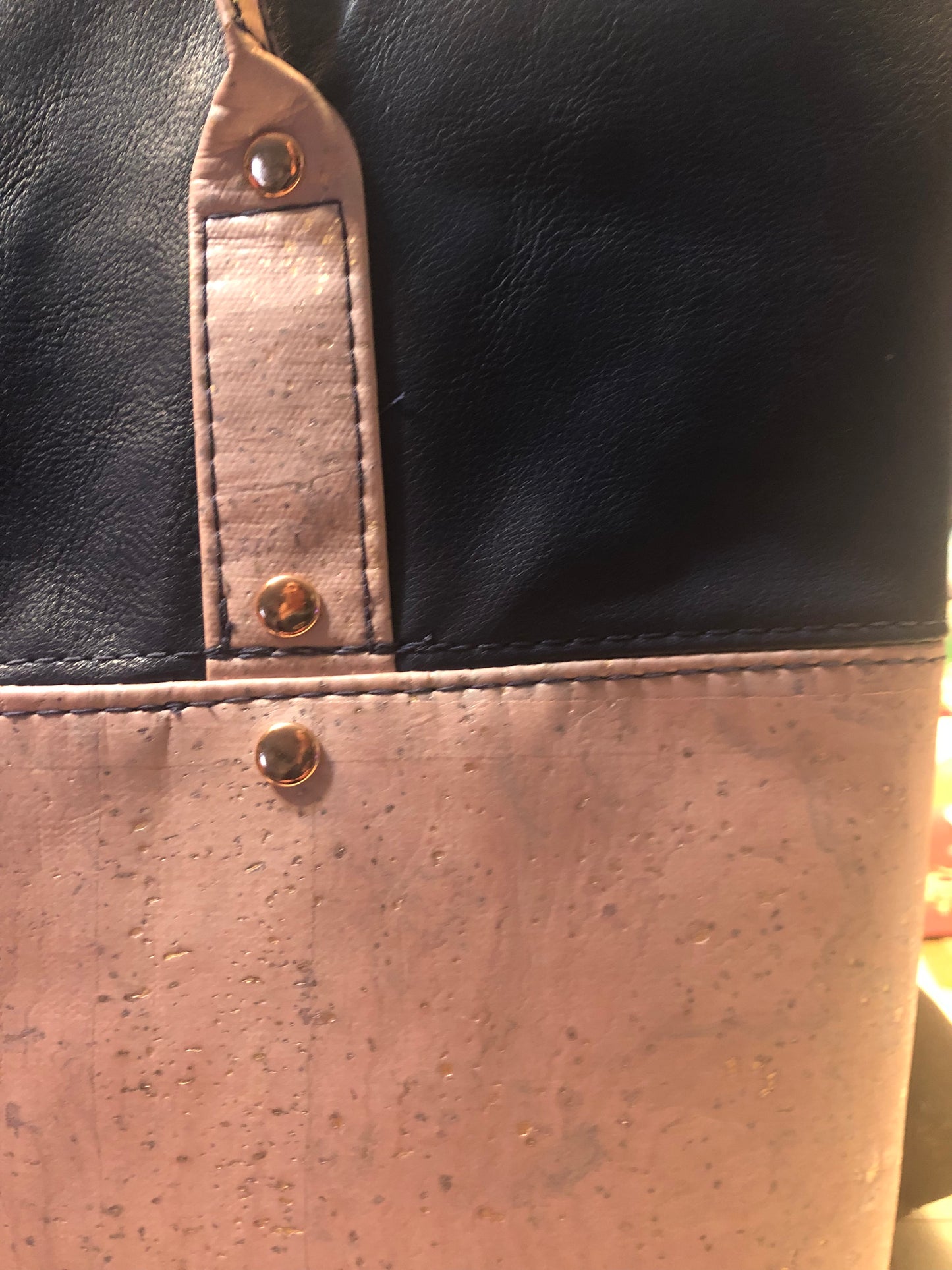 Cork tote bag with attached key fob and attached eyeglass holder. Never lose them again! This is a great wide top bag with lots of pockets including a pen slot. This is an opened style tote bag.