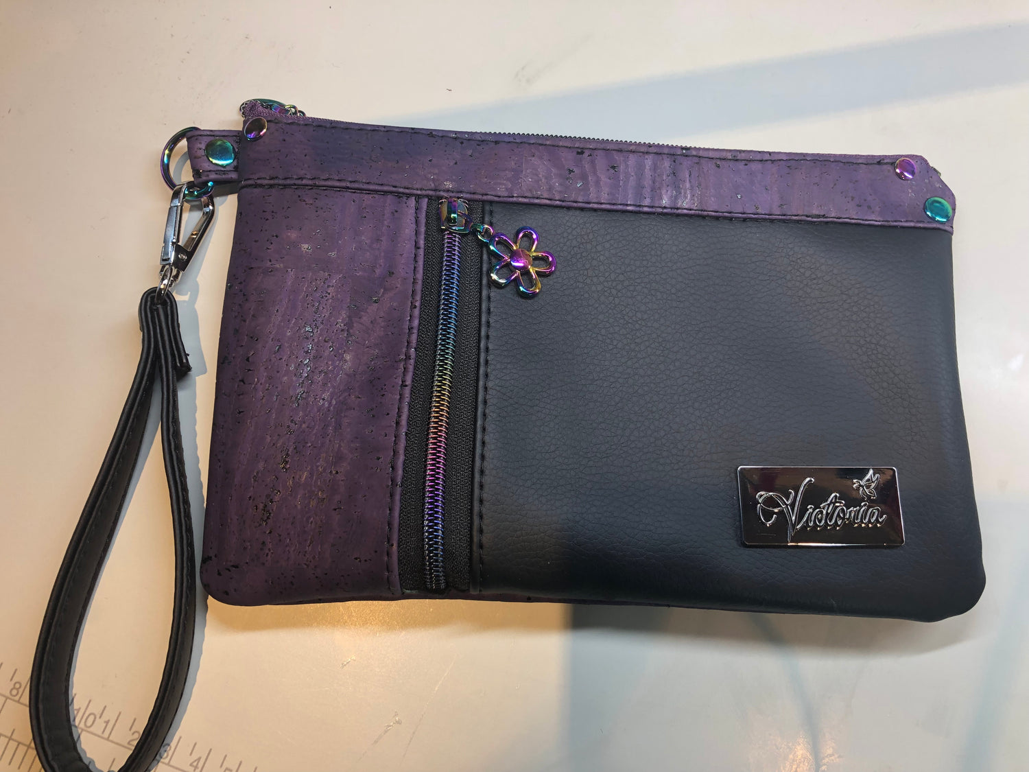 Look at that rainbow zip! Perfect size clutch 10 x 6.5 with a wristlet strap.