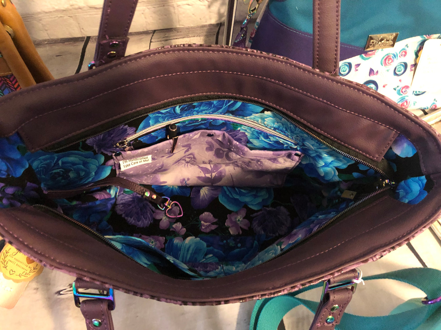 Everyday tote shoulder bag in purple crockadail. Rainbow hardware, recessed zipper.  Interior with pretty floral cotton