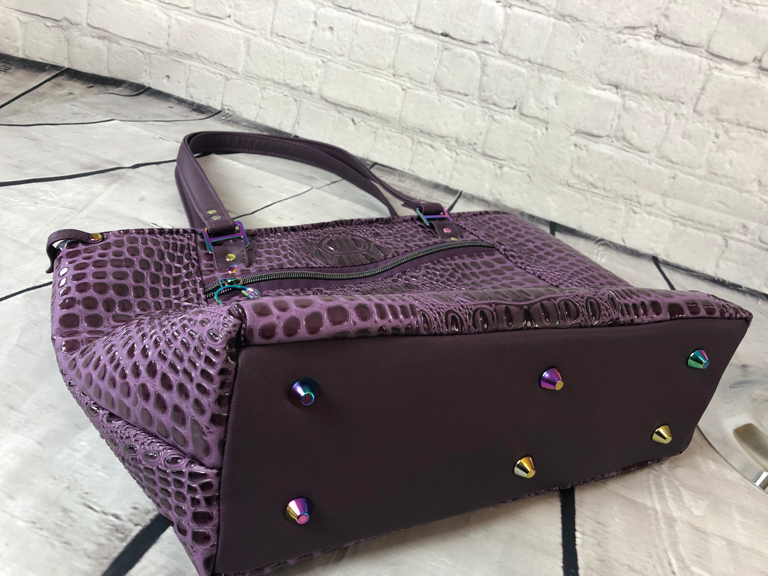 Everyday tote shoulder bag in purple crockadail. Rainbow hardware, recessed zipper. 6 rainbow purse feet