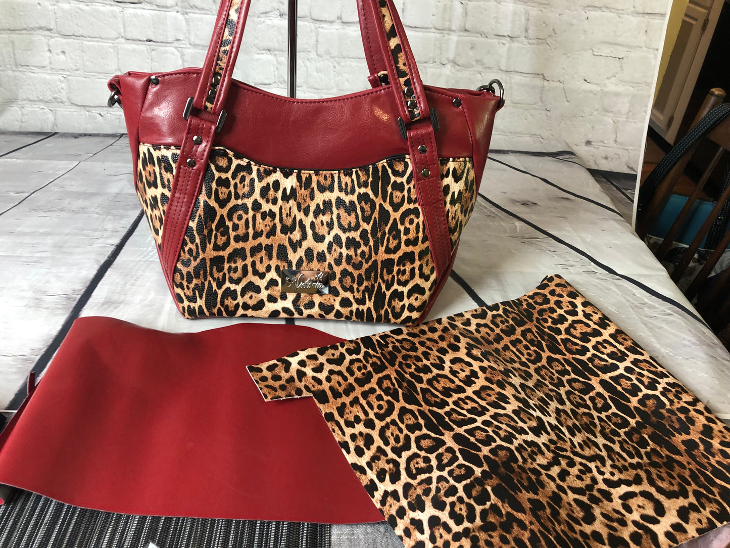 SOLD Classy Burgandy vinyl and animal print handbag/crossbody