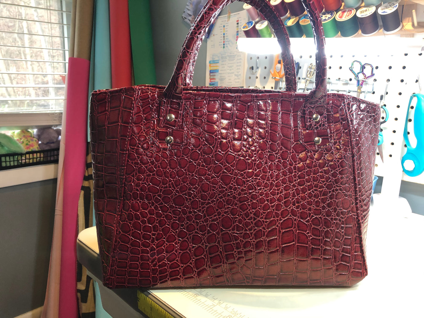 Cherry crocodile handbag