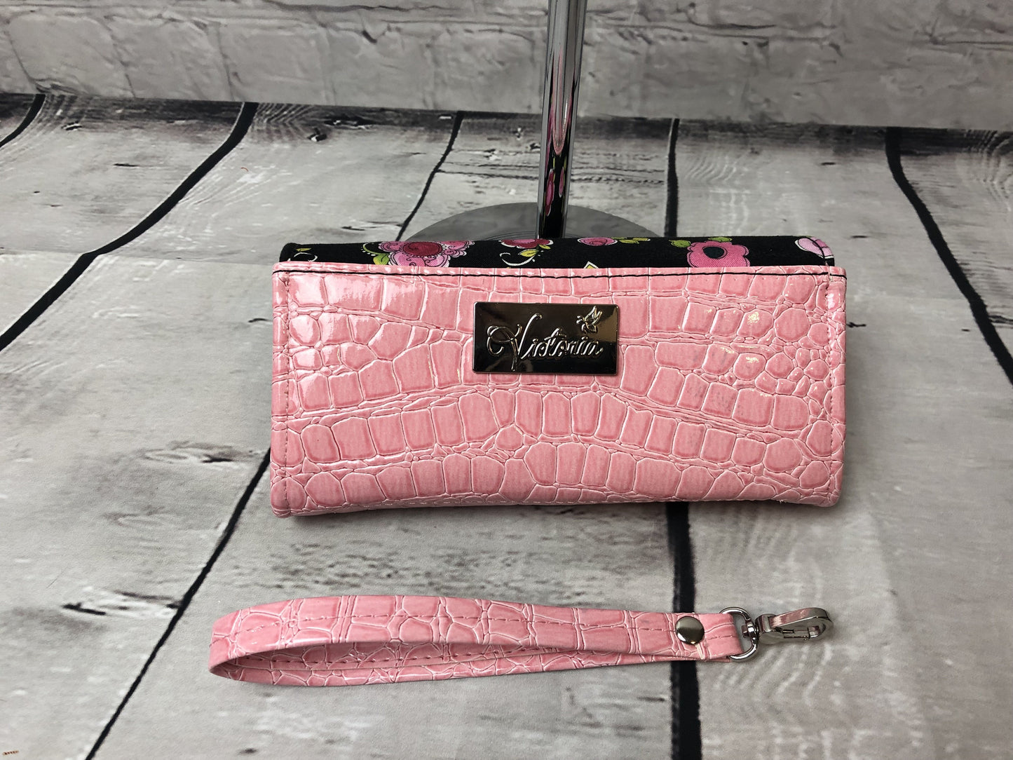 bags by victoria tag, pink croc and wristlet srap