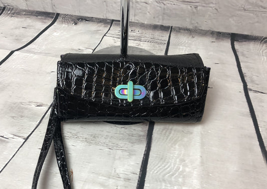 Black crocodile wallet with rainbow hardware twist lock and rivets. The interior is made with quality floral cotton fabric in beautiful purple and blue flowers.