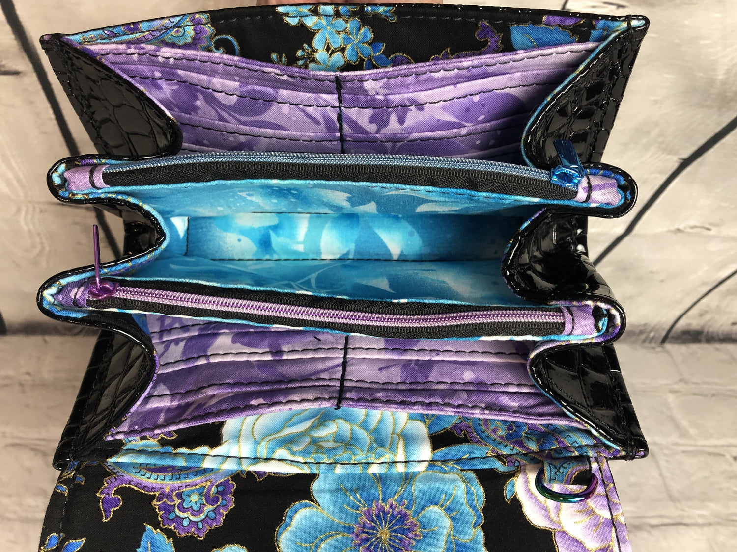 Beautiful floral purple and blue poppies. Two zipper pockets.