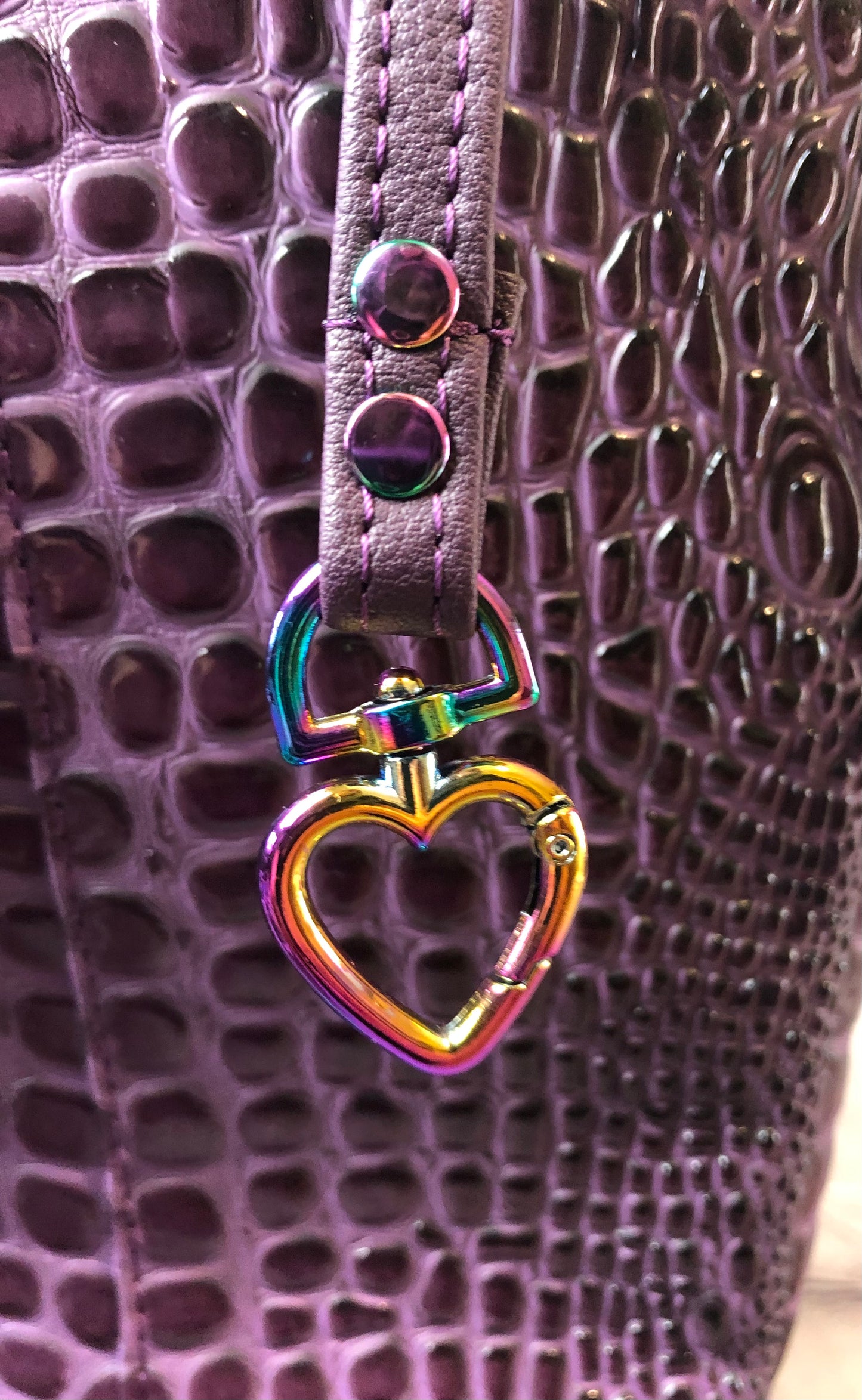 Everyday tote shoulder bag in purple crockadail. Rainbow hardware, recessed zipper.    Heart shape keyfob attatchment sewn into lining