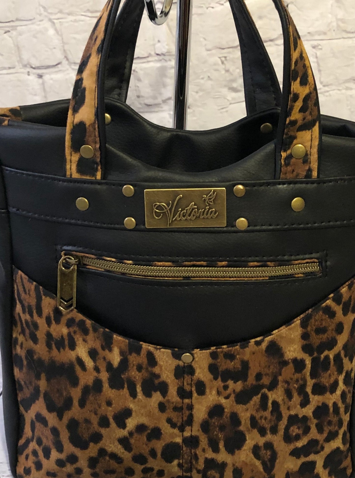 SOLD-SOLD Martini Crossbody. Black + animal print. 5 exterior pockets