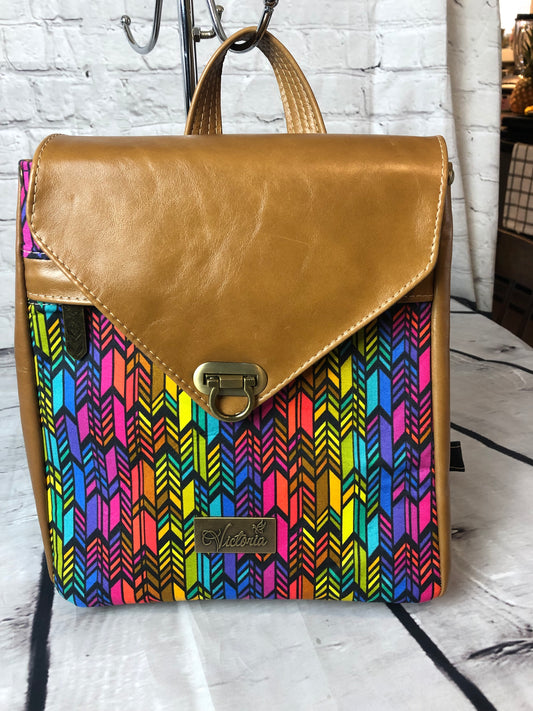 Meraki leather trim backpack with designer Anna Marie colorful fabric. 