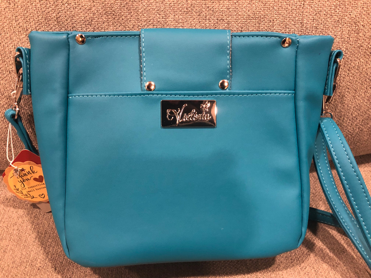 Zarah crossbody in teal back