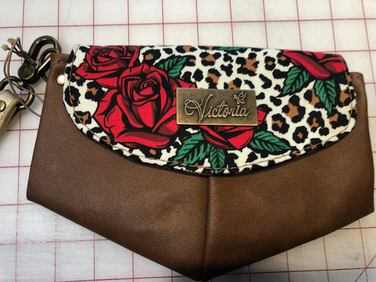 Small tan rose clutch wristlet