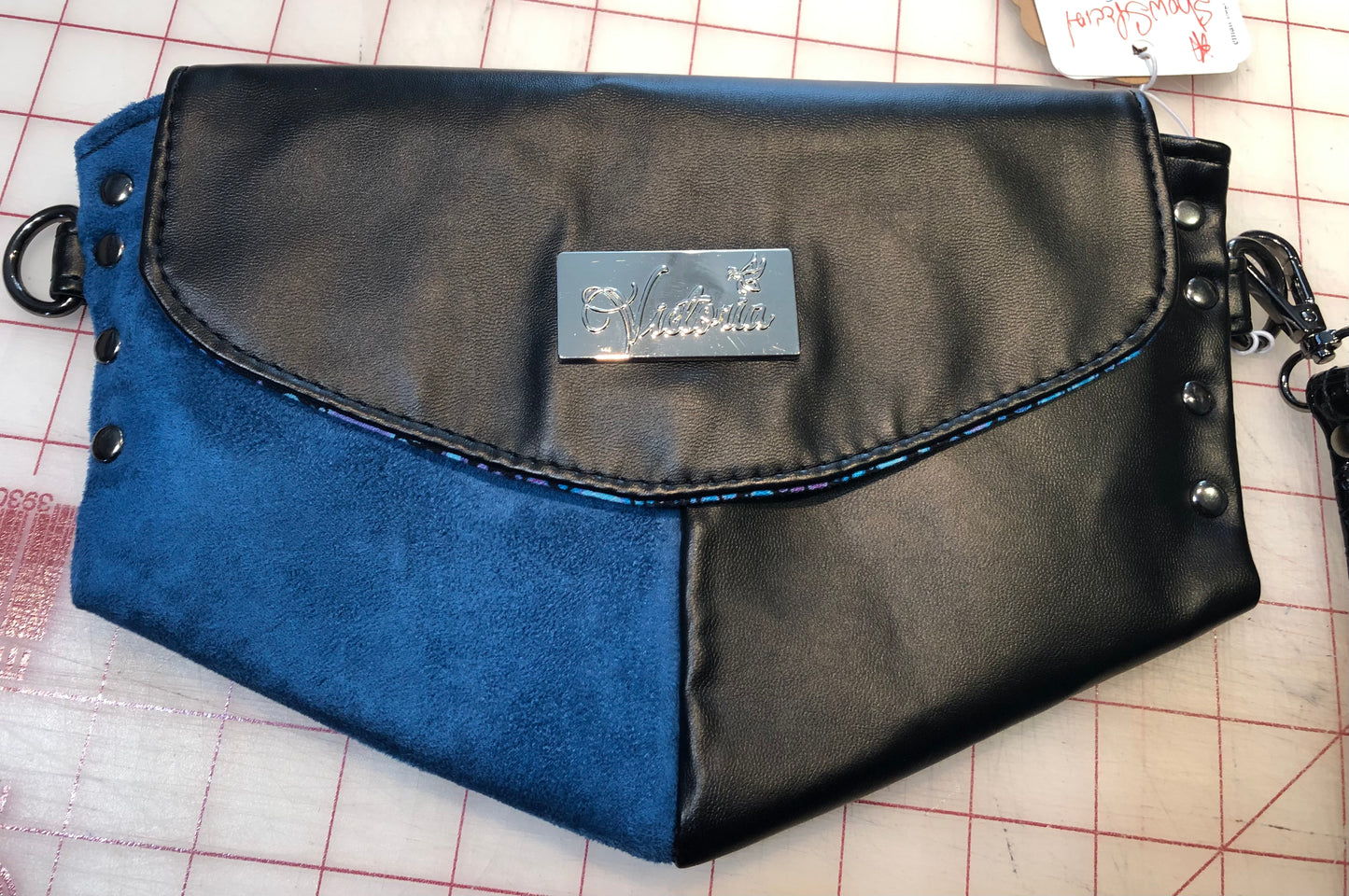 Clutch wristlet in faux  suede & vinyl