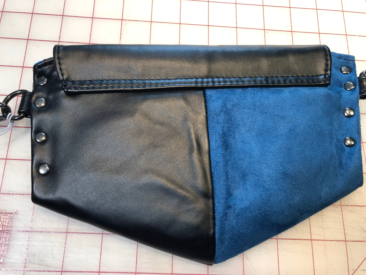 Clutch wristlet in faux  suede & vinyl