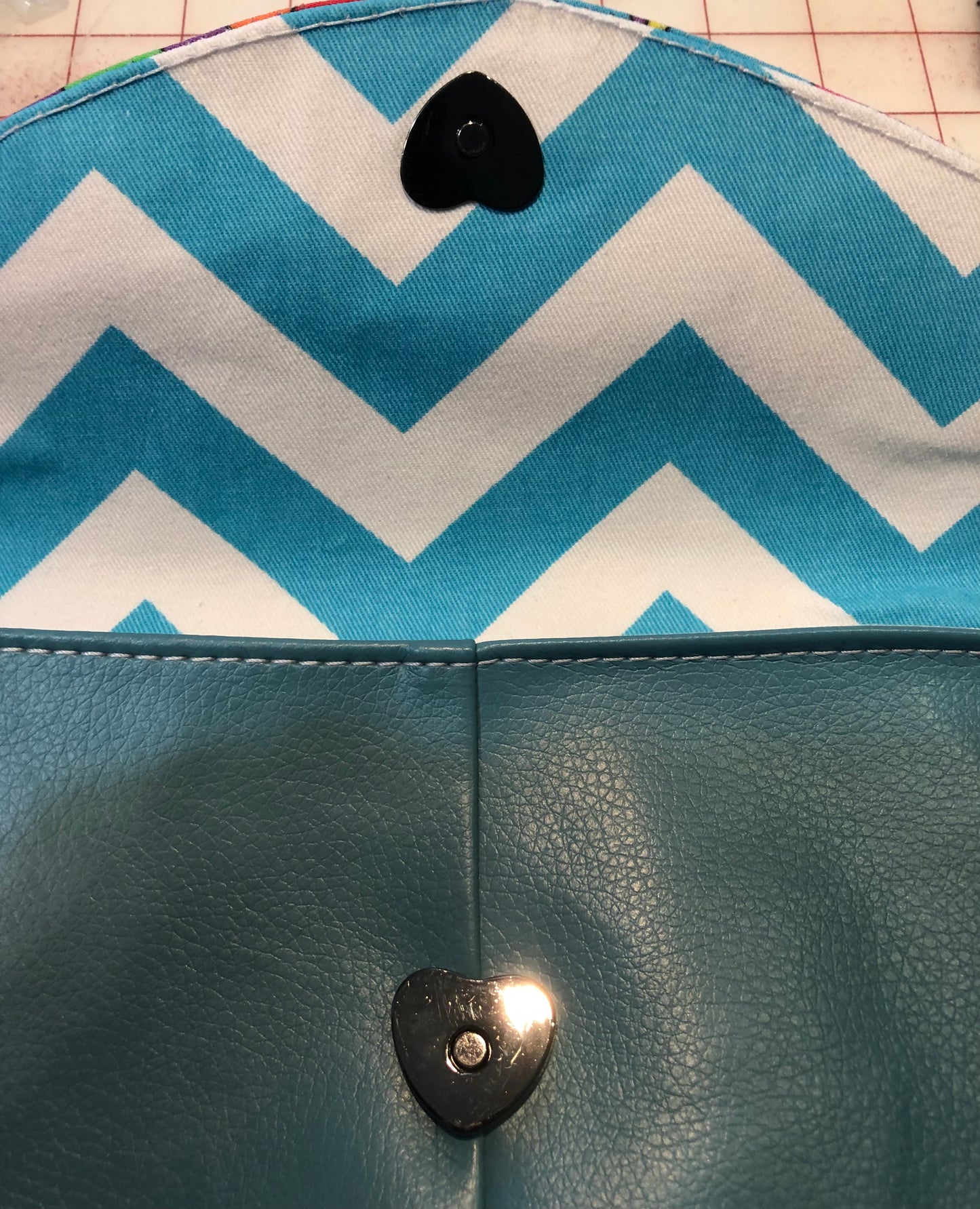 Peace clutch wristlet